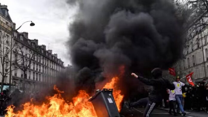 Paris On Fire: Protesters Clash With Police, 200 Arrested Amid Widespread Violence In France