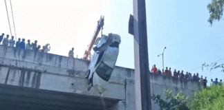 Car plunges off Mukarba Chowk flyover onto railway tracks in Delhi; driver safe with minor injuries Car plunges off Mukarba Chowk flyover onto railway tracks in Delhi; driver safe with minor injuries
