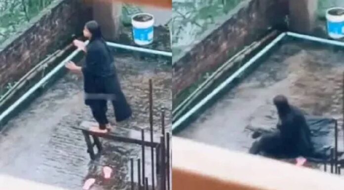 A mobile phone set on a tripod with a broken stool beside it, representing the exact accident moment without showing the girl falling A mobile phone set on a tripod with a broken stool beside it, representing the exact accident moment without showing the girl falling