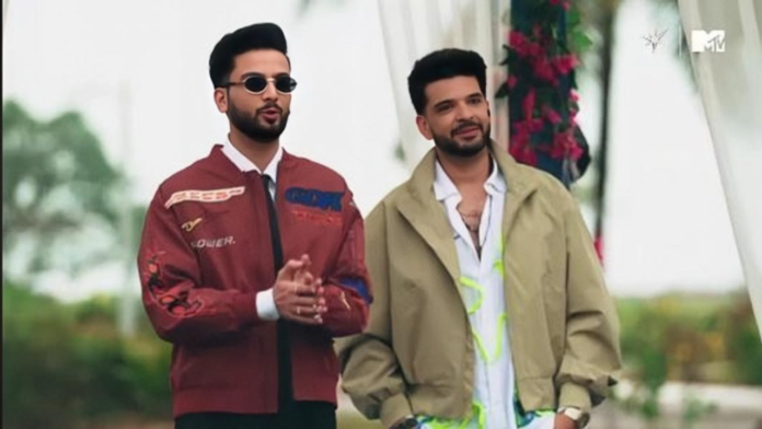 _Karan Kundra Karan Kundra recently revealed his new tattoo to the paparazzi at a Ramadan celebration event in Mumbai.