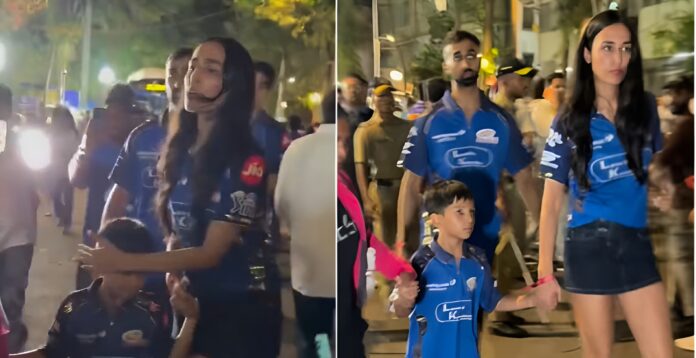 bdbdb-Picsart-AiImageEnhancer Mahieka Sharma Snaps at Paps, Shields Hardik Pandya’s Son Agastya After IPL Match