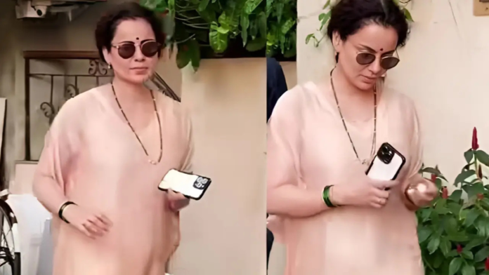 Kangana Ranaut On Thursday in the viral video, Kangana Ranaut can be seen leaving her home, while wearing a simple peach outfit, with bindi, sunglasses, green bangles, and a mangalsutra around her neck.