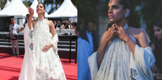 Pakistani Star Sanam Saeed Turns Heads At Cannes 2026 In Stunning Peacock-Inspired Outfit The outfit was designed with a high-neck halter style detail and a deep neck at the back.