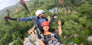 Paragliding Pilot Sparked Buzz: Plucked Leaves From a Treetop Mid-Ride To Gift Female Passenger Paragliding Pilot Sparked Buzz: Plucked Leaves From a Treetop Mid-Ride To Gift Female Passenger
