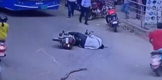Viral Video Shows Tree Branch Hitting Helmetless Biker In Bengaluru; Rider Critically Hurt Viral Video Shows Tree Branch Hitting Helmetless Biker In Bengaluru; Rider Critically Hurt