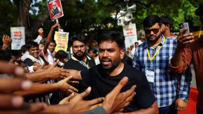 Untitled design - 2026-07-21T152531.619 CJP Protest Continues In Delhi; AAP Rolls Out Helpline For Legal And Medical Aid