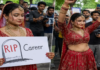 Protester in Bridal Wear Draws Crowds at Jantar Mantar, Demands Dharmendra Pradhan’s Resignation Protester in Bridal Wear Draws Crowds at Jantar Mantar, Demands Dharmendra Pradhan's Resignation