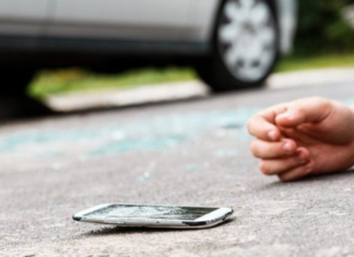 Viral Video: Woman Lies On Road, Then Drives Through Barricade As Police Watch Viral Video: Woman Lies On Road, Then Drives Through Barricade As Police Watch