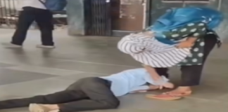 Viral Video: Man Falls At Woman’s Feet At Mumbai Railway Station, Crowd Watches Viral Video: Man Falls At Woman's Feet At Mumbai Railway Station, Crowd Watches