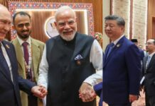 Who Are These Two Men Standing Beside PM Modi And Xi Jinping During Their BRICS Meet? Who Are These Two Men Standing Beside PM Modi And Xi Jinping During Their BRICS Meet?