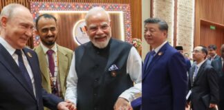 Who Are These Two Men Standing Beside PM Modi And Xi Jinping During Their BRICS Meet? Who Are These Two Men Standing Beside PM Modi And Xi Jinping During Their BRICS Meet?
