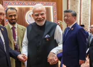 Who Are These Two Men Standing Beside PM Modi And Xi Jinping During Their BRICS Meet? Who Are These Two Men Standing Beside PM Modi And Xi Jinping During Their BRICS Meet?