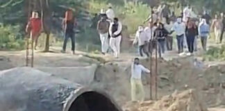 Firing Erupts During Plot Boundary Dispute, People Hide Behind Bricks to Save Their Lives