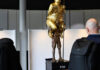 Nude statue of Trump erected near the European Parliament, inscribed 'King of Injustice'
