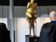 Nude statue of Trump erected near the European Parliament, inscribed 'King of Injustice'